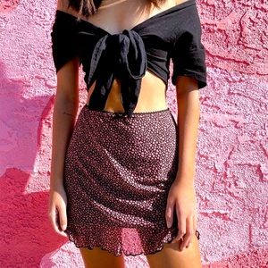 Lottie Moss /PacSun Black mini skirt  with pink hearts